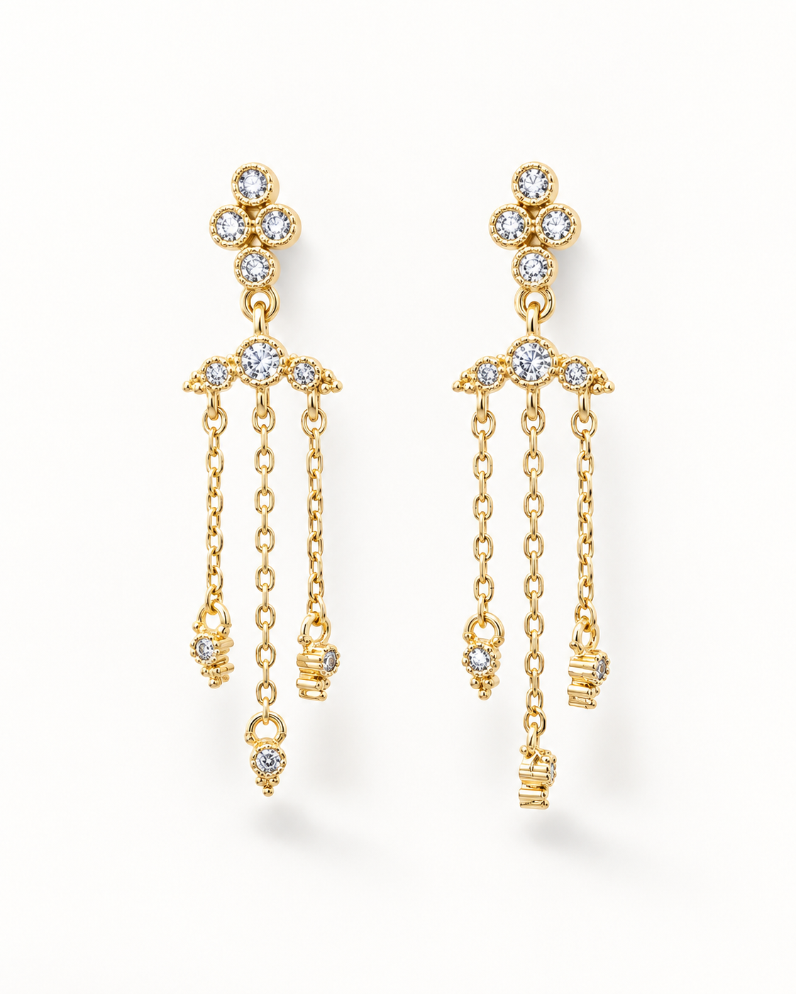 A pair of gold dangle earrings with clear gemstones, displayed against a clean white background.